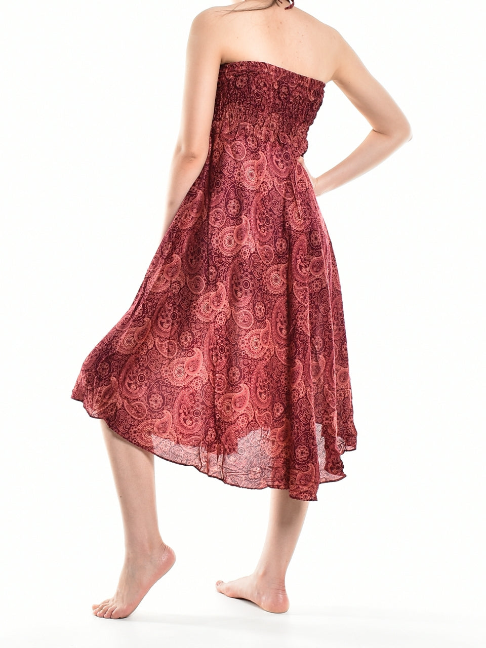 Bohotusk Red Orbit Long Skirt featuring a coconut buckle, showcasing its flowing design and elasticated smocked waist.